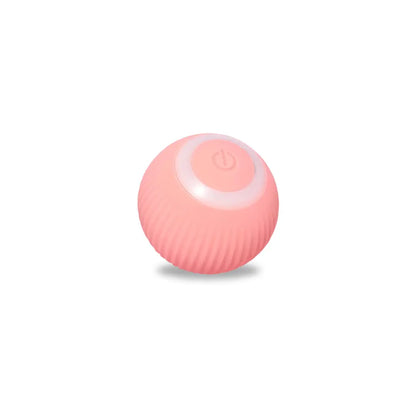 Pink spherical device with a power button on a white background