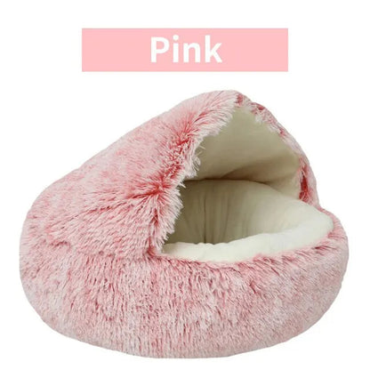 Pink fluffy pet bed on a white background with 'Pink' label above it.