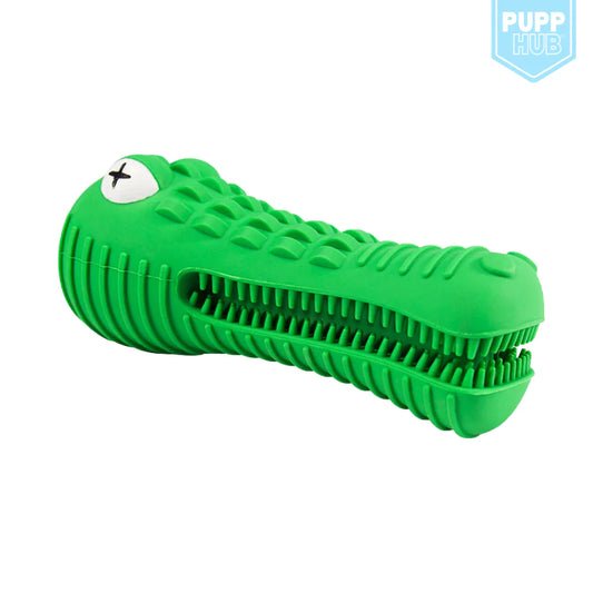 Green dog toy with a white label on a white background
