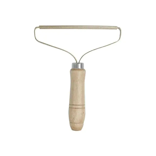 Metal lint roller with wooden handle on a white background